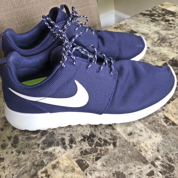 purple nike slip ons